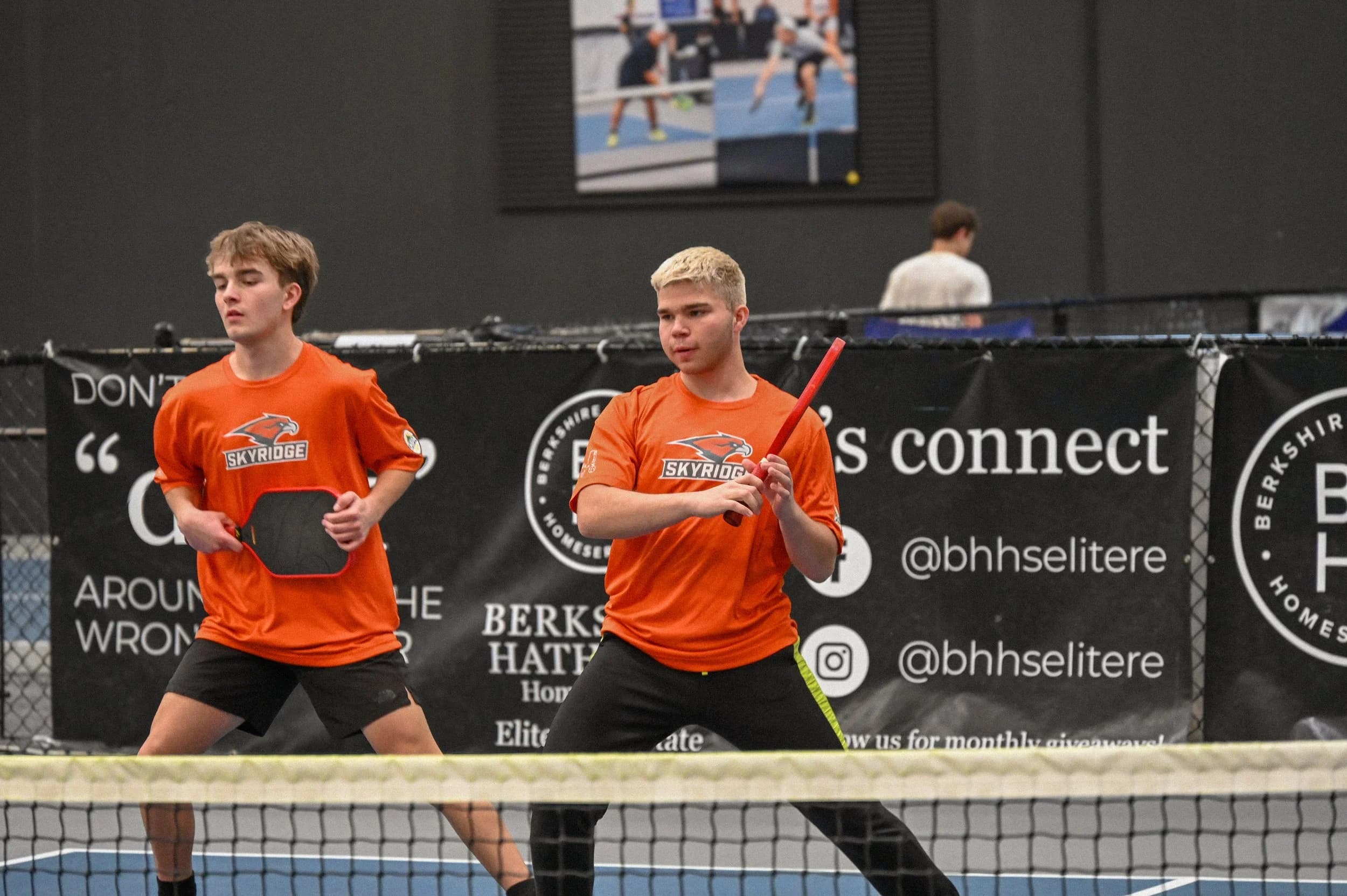 Boys playing pickleball 3